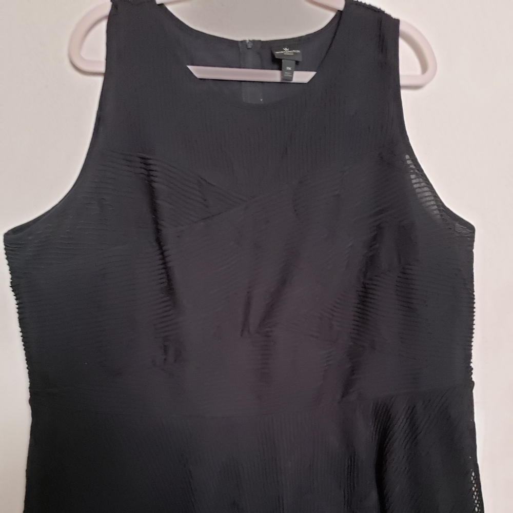 Sleeveless top with peplum bottom